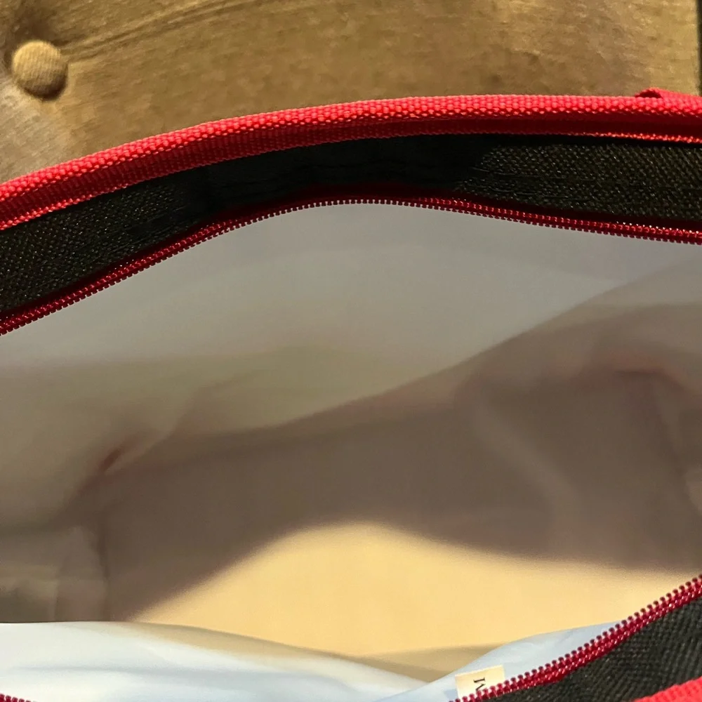 Trader Joe's Black and Red Insulated shopping Tote Bag.